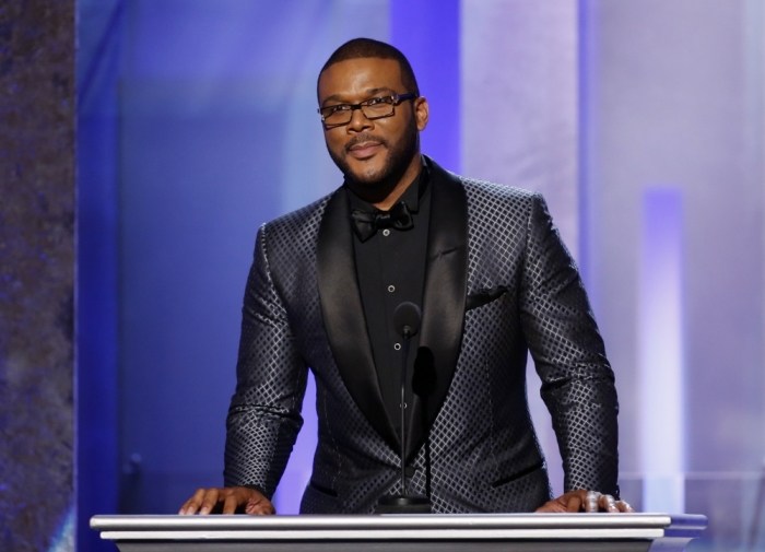 Tyler Perry speaks on stage during the 45th NAACP Image Awards in Pasadena, California February 22, 2014.