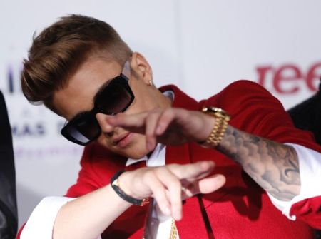 Singer Justin Bieber poses at the premiere of the documentary 