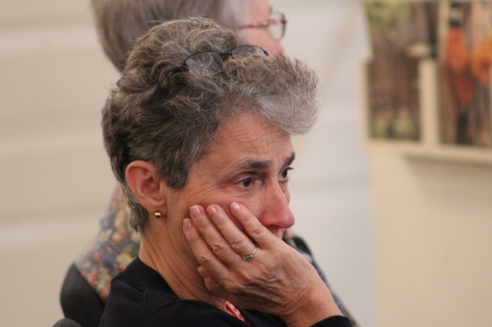 A woman remembers the fallen on the 14th anniversary of the 9/11 attacks during a mass for peace at St. Paul's Chapel in Lower Manhattan on September 11, 2015.