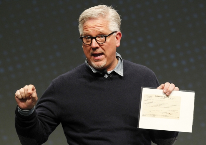Radio and television personality Glenn Beck speaks to a gathering at FreePAC Kentucky at the Kentucky International Convention Center in Louisville, Kentucky, April 5, 2014.