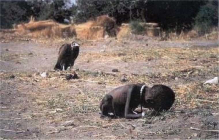 Kevin Carter's Pulitzer Prize winning photograph of a Sudanese child and a vulture