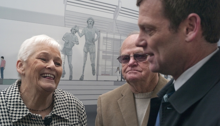 Betty Fox, Rolly Fox (C) and Darrell Fox (R), family of the Marathon of Hope's Terry Fox, gather in front of drawings for a new statue to be erected in honour of Terry in Vancouver, British Columbia January 18, 2011. Terry, with one leg having been amputated, set off on a cross-Canada run in 1980 to raise money and awareness for cancer research but was forced to end his quest after 143 days and later died of cancer in 1981.