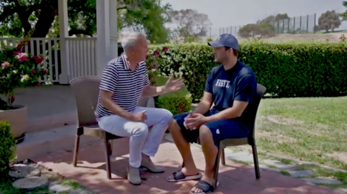 Pastor Ed Young speaking one-on-one with quarterback Tony Romo
