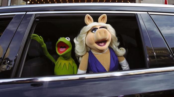 The characters of Kermit and Miss Piggy arrive at the premiere of 'Muppets Most Wanted' in Hollywood, California in this file photo taken March 11, 2014.