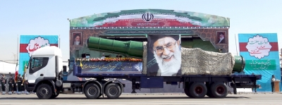 A military truck carrying a missile and a picture of Iran's Supreme Leader Ayatollah Ali Khamenei is seen during a parade marking the anniversary of the Iran-Iraq war (1980-88), in Tehran, September 22, 2015.