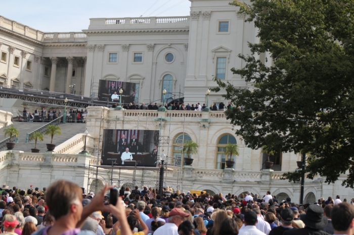 Thousands gather on the front lawn of the U.S. Capitol to watch the broadcast of Pope Francis' historic address to a joint session of Congress on Sept. 24, 2015 in Washington, D.C.