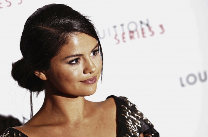 Actress Selena Gomez arrives for the 'Louis Vuitton Series 3' Exhibition gala opening in London, Britain, September 20, 2015.