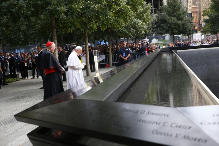 Pope Francis prays for the victims at the September 11, 2001 memorial in New York City on September 25.