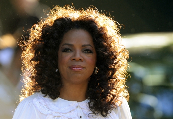 U.S. television presenter Oprah Winfrey arrives for the birthday dinner party of former president of South Africa Nelson Mandela at Hyde Park in London, England, June 25, 2008.