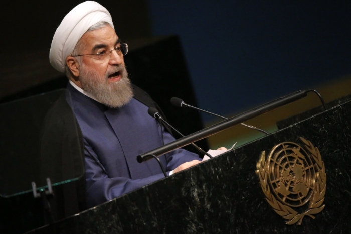 Iranian President Hassan Rouhani addresses attendees during the 70th session of the United Nations General Assembly at the U.N. headquarters in New York, September 28, 2015.