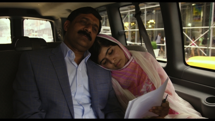 Malala Yousafzai, a Pakistani Muslim girl who was shot in 2012 by the Taliban for publicly speaking out against them, with her father, Ziauddin.