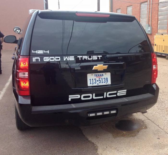 A Childress Police Department patrol unit in Texas bearing the 'In God We Trust' decal.