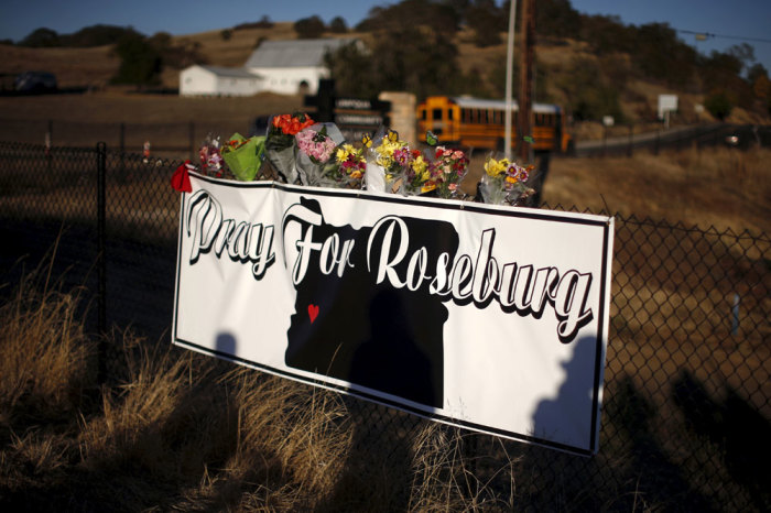 Memorial flowers are seen outside Umpqua Community College in Roseburg, Oregon, United States, October 2, 2015. Gunman Chris Harper-Mercer entered an English class Thursday and opened fire, killing nine people and wounding seven others before taking his own life, authorities said, in yet another burst of U.S. gun violence that ranks as the deadliest this year.