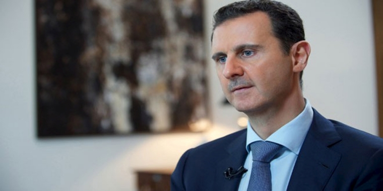 Syria's President Bashar al-Assad speaks during an interview with the Iranian Khabar TV channel in this handout photograph released by Syria's national news agency SANA on October 4, 2015. Al-Assad said the success of a military campaign by Russia, Syria and its allies was vital to save the Middle East from destruction, a day after Moscow said it would step up air strikes against Islamic State targets across Syria.