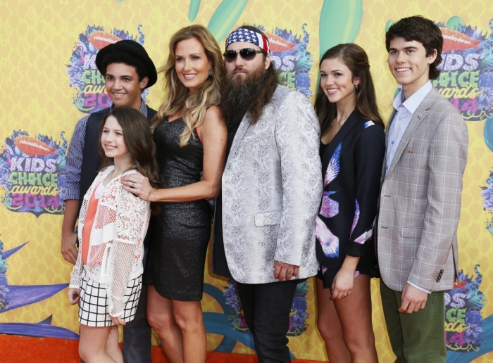 Willie Robertson and Korie Robertson with their children arrive at the 27th Annual Kids' Choice Awards in Los Angeles, California, March 29, 2014.