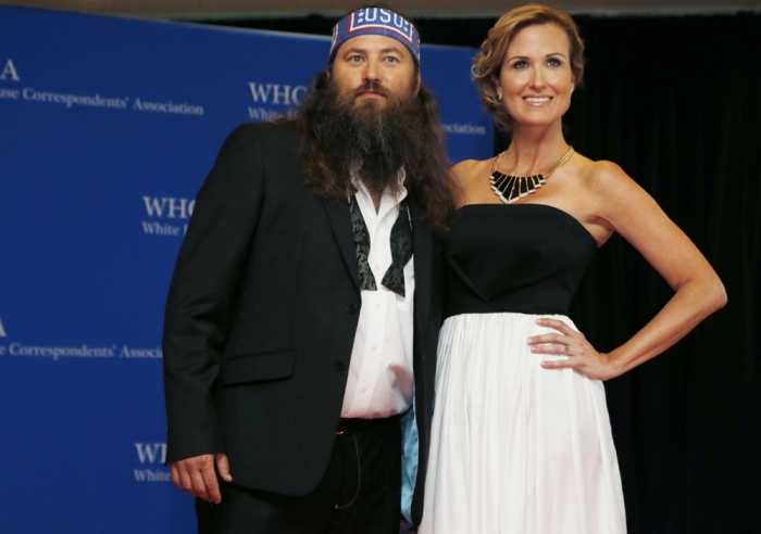 Willie and Korie Robertson arrive on the red carpet at the annual White House Correspondents' Association Dinner in Washington, May 3, 2014.