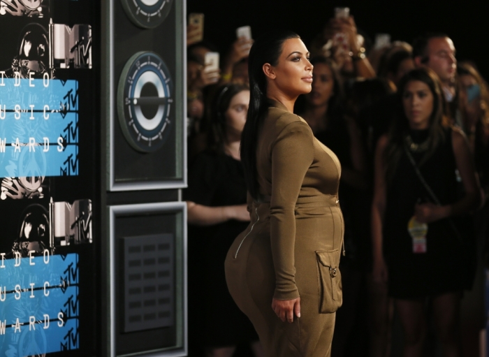 TV personality Kim Kardashian arrives at the 2015 MTV Video Music Awards in Los Angeles, California, August 30, 2015.