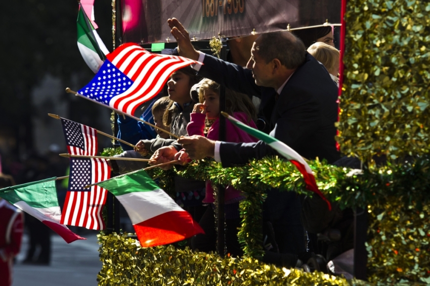People take part in the 69th Annual Columbus Day Parade in New York, October 14, 2013.