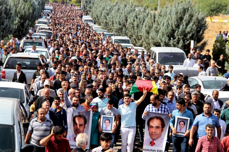 Mourners carry the coffin of Abdullah Erol, a victim of Saturday's bomb blasts in Ankara, during a funeral ceremony in the Kurdish dominated southeastern city of Diyarbakir, Turkey, October 12, 2015. Abdullah Erol was a candidate of the pro-Kurdish Peoples' Democratic Party for the November 1 parliamentary election.