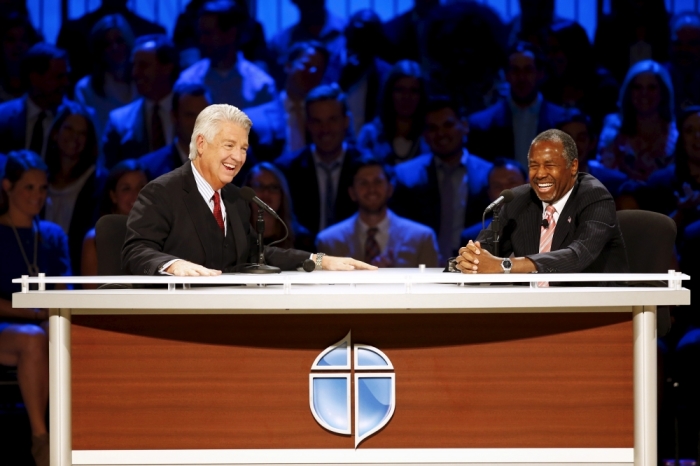 U.S. Republican presidential candidate Dr. Ben Carson (R) responds to a question from Dr. Jack Graham, Pastor of Prestonwood Baptist Church, at the North Texas Presidential Forum hosted by the Faith & Freedom Coalition and Prestonwood Baptist Church in Plano, Texas, October 18, 2015.