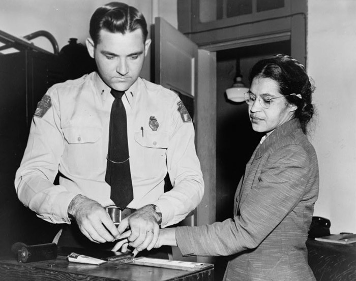 This photo shows Rosa Parks being booked for civil disobedience in February 1956 amid the Montgomery Bus Boycott.
