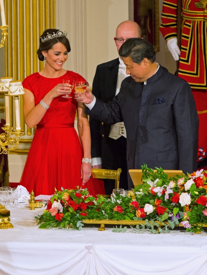 Chinese President Xi Jinping with the Duchess of Cambridge at a state banquet at Buckingham Palace, London, during the first day of his state visit to Britain, October 20, 2015.