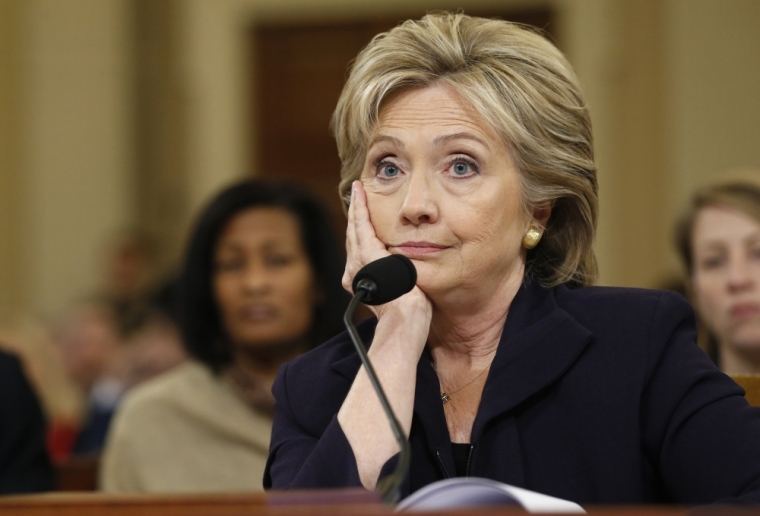 Democratic presidential candidate Hillary Clinton listens to a question as she testifies before the House Select Committee on Benghazi, on Capitol Hill in Washington October 22, 2015. The congressional committee is investigating the deadly 2012 attack on the U.S. diplomatic mission in Benghazi, Libya, when Clinton was the secretary of state.