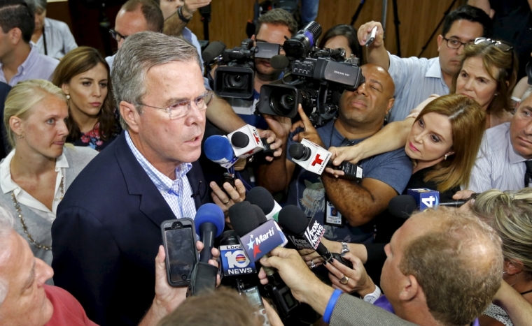 Former Florida Governor and Republican candidate for president Jeb Bush speaks to the media following a town hall with high school students at La Progresiva Presbyterian School in Miami, Florida, September 1, 2015.