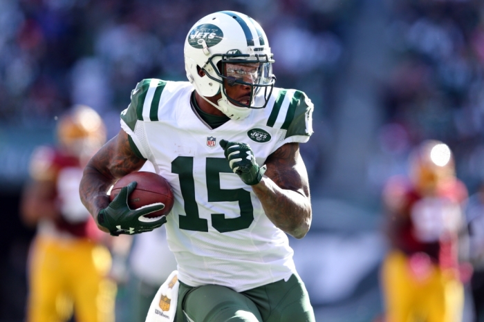 New York Jets wide receiver Brandon Marshall (15) carries the ball to score a touchdown against the Washington Redskins during the third quarter at MetLife Stadium, East Rutherford, New Jersey, October 18, 2015.