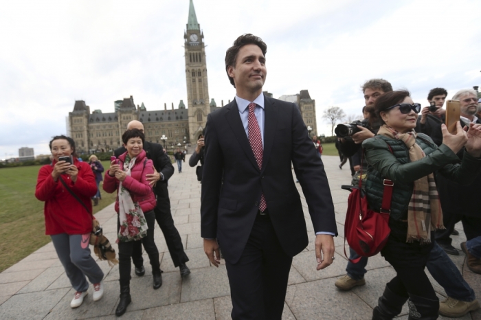 Canada's Liberal leader and Prime Minister-designate Justin Trudeau walks on Parliament Hill in Ottawa, Ontario, October 20, 2015.