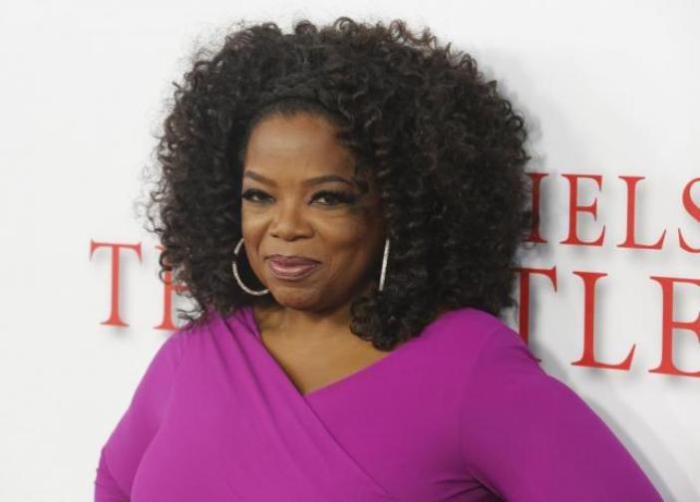 Actress Oprah Winfrey, a cast member of the film ''Lee Daniels' The Butler'', poses at the film's premiere in Los Angeles August 12, 2013.