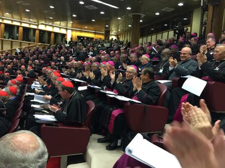 The synod fathers clapping relieved after 6 hours reading and voting on each of the 94 paragraphs of the final document, World Synod of the Catholic Church, Vatican City, October 24, 2015.