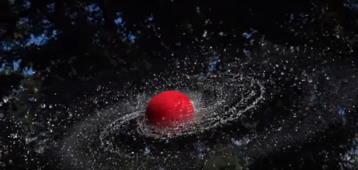 The Slow Mo Guys film a waterlogged foam ball spinning in slow motion.