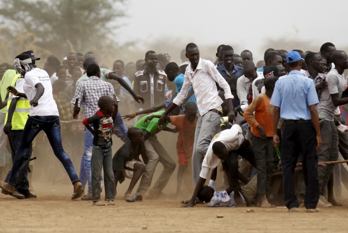 Refugees from South Sudan jostle for the queue to attend the celebrations to mark World Refugee Day at the Kakuma refugee camp in Turkana District, northwest of Kenya's capital Nairobi, June 20, 2015. June 20 is World Refugee Day, an occasion that draws attention to those who have been displaced around the globe.