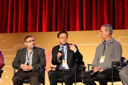 Greg Jao, vice president and director of campus engagement at InterVarsity Christian Fellowship/USA in New York City (c) talks about racial reconciliation at Movement Day 2015 on Thursday October 29, 2015. Gabriel Salguero, president of the National Latino Evangelical Coalition (NaLEC) (l) and Pete Scazzero, founder of New Life Fellowship Church in Queens, New York (r) listen.
