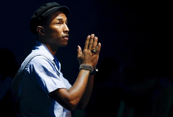 Singer-songwriter Pharrell Williams performs during the MTV EMA awards at the Assago forum in Milan, Italy, October 25, 2015.