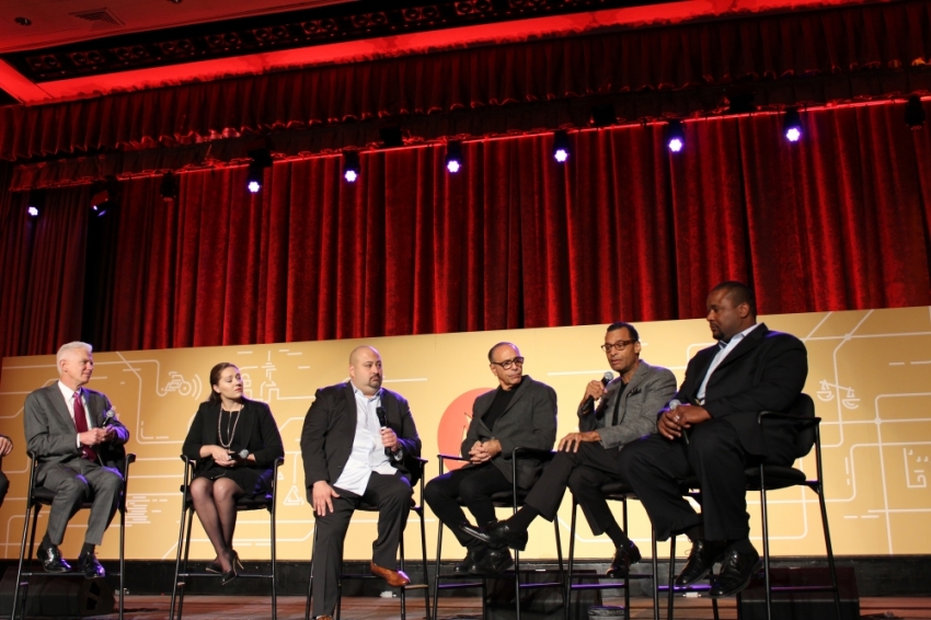 Movement Day 2015 panelists discuss bridging the generational divide in cities on October 29, 2015. Seated (from l-r) are D.G. Elmore, chairman of the U.S. Board of Directors Elmore Companies and his daughter, Lauren Elmore, president of Firmatek, Elmore Companies; Adam Durso, executive pastor of Christ Tabernacle in Glendale, Queens, New York and his father, Michael Durso, senior pastor, Christ Tabernacle; Rev. Dr. A.R. Bernard Sr., senior pastor of Christian Cultural Center in Brooklyn, New York and his son Jamaal Bernard, associate pastor, chief of operations, Christian Cultural Center.
