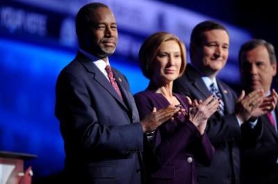 Republican U.S. presidential candidate Dr. Ben Carson looks back as business Donald Trump (not pictured) takes the stage as he stands with former HP CEO Carly Fiorina, U.S. Sen. Ted Cruz and Gov. Chris Christie before the start of the 2016 U.S. Republican presidential candidates debate held by CNBC in Boulder, Colorado, Oct. 28, 2015.