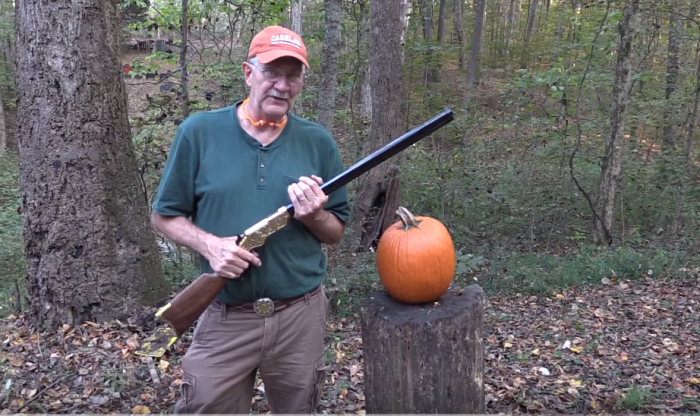 Gun expert shows public how to carve a pumpkin with a rifle.