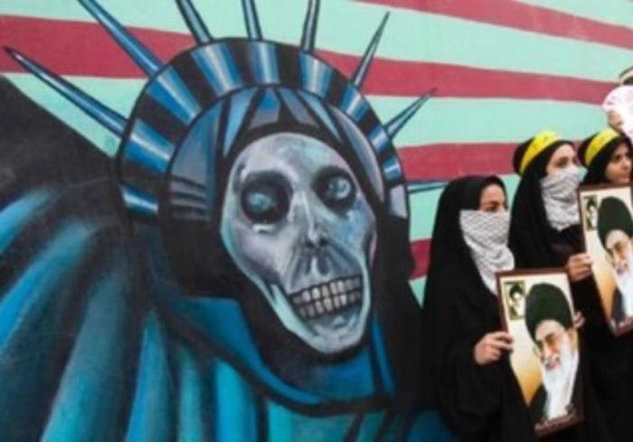 Anti-US poster on American embassy in Tehran in this undated photo.