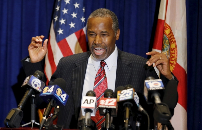 U.S. Republican presidential candidate Ben Carson reacts to a question about his past at a news conference before he delivers the keynote speech at the Black Republican Caucus of South Florida's scholarship gala at the PGA National Resort and Spa in Palm Beach Gardens, Florida November 6, 2015.