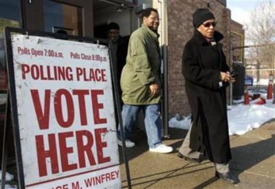 Voters leave a polling station after voting in the Michigan primary election in Detroit, Michigan, January 15, 2008.