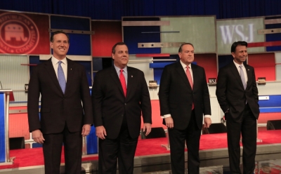 Republican U.S. presidential candidates (L-R) former U.S. Senator Rick Santorum, New Jersey Governor Chris Christie, former Arkansas Governor Mike Huckabee and Louisiana Governor Bobby Jindal pose during a photo opportunity before the start of a forum held for lower polling candidates held by Fox Business Network before their 2016 U.S. Republican presidential candidates debate in Milwaukee, Wisconsin, November 10, 2015.