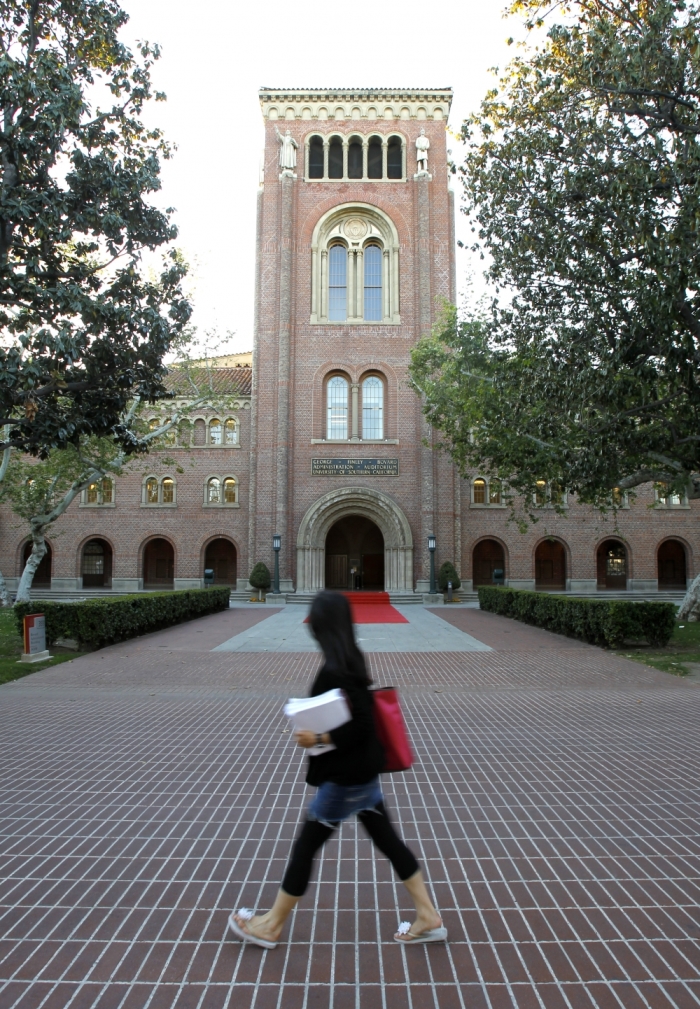 A student walks by the Bovard Administration Building at the University of Southern California in Los Angeles, April 7, 2010.