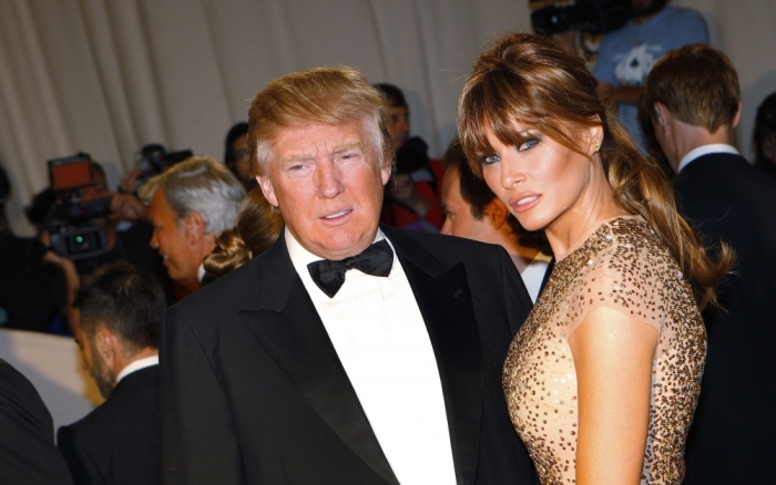 Real estate magnate and television personality Donald Trump and his wife Melania stand on the red carpet at the Metropolitan Museum of Art Costume Institute Benefit celebrating the opening of the exhibition 'Alexander McQueen: Savage Beauty' in New York, May 2, 2011.