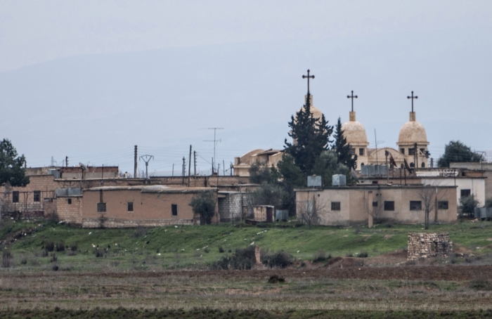 A general view shows a church in the Assyrian village of Abu Tina, which was recently captured by Islamic State fighters, February 25, 2015. Kurdish militia pressed an offensive against Islamic State in northeast Syria on Wednesday, cutting one of its supply lines from Iraq, as fears mounted for dozens of Christians abducted by the hardline group. The Assyrian Christians were taken from villages near the town of Tel Tamr, some 20 km (12 miles) to the northwest of the city of Hasaka. There has been no word on their fate. There have been conflicting reports on where the Christians had been taken.