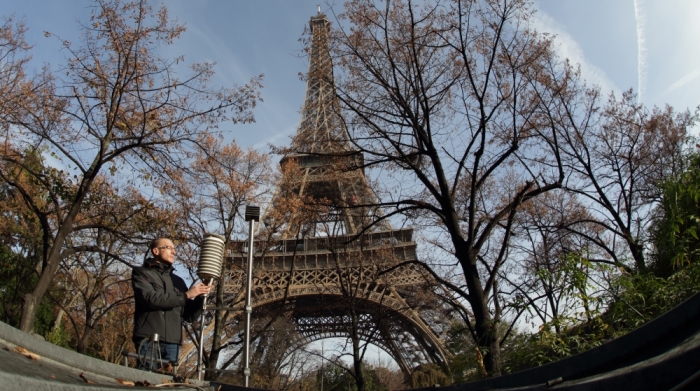 Airparif technician Benjamin checks the sensors at a monitoring station recording pollution and air quality near the Eiffel Tower in Paris, France, November 12, 2015.