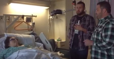 Christian music duo the Singing Contractors perform "Old Rugged Cross" per the request of a hospitalized woman.