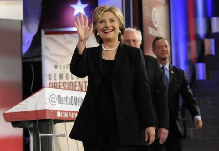 Democratic U.S. presidential candidate former Secretary of State Hillary Clinton is followed on stage by Senator Bernie Sanders and former Maryland Governor Martin O'Malley (R) ahead of the second official 2016 U.S. Democratic presidential candidates debate in Des Moines, Iowa, November 14, 2015.