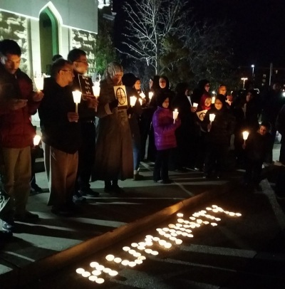 Interfaith vigil is held in November 2015 in remembrance of the victims of terrorist attacks in Paris, France and Beirut, Lebanon.